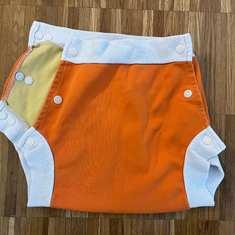 Schlupfüberhose mit Knöpfen