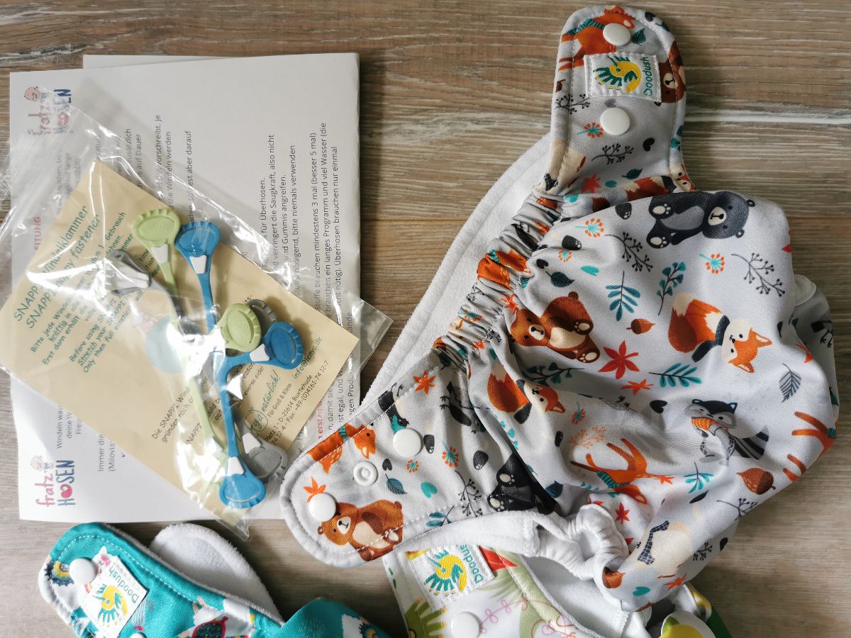 Wie Neu - 6x Doodush Überhosen XKKO Mullwindeln Komolettpaket - One Size Wie Neu - 6x Doodush Überhosen XKKO Mullwindeln Komolettpaket - One Size