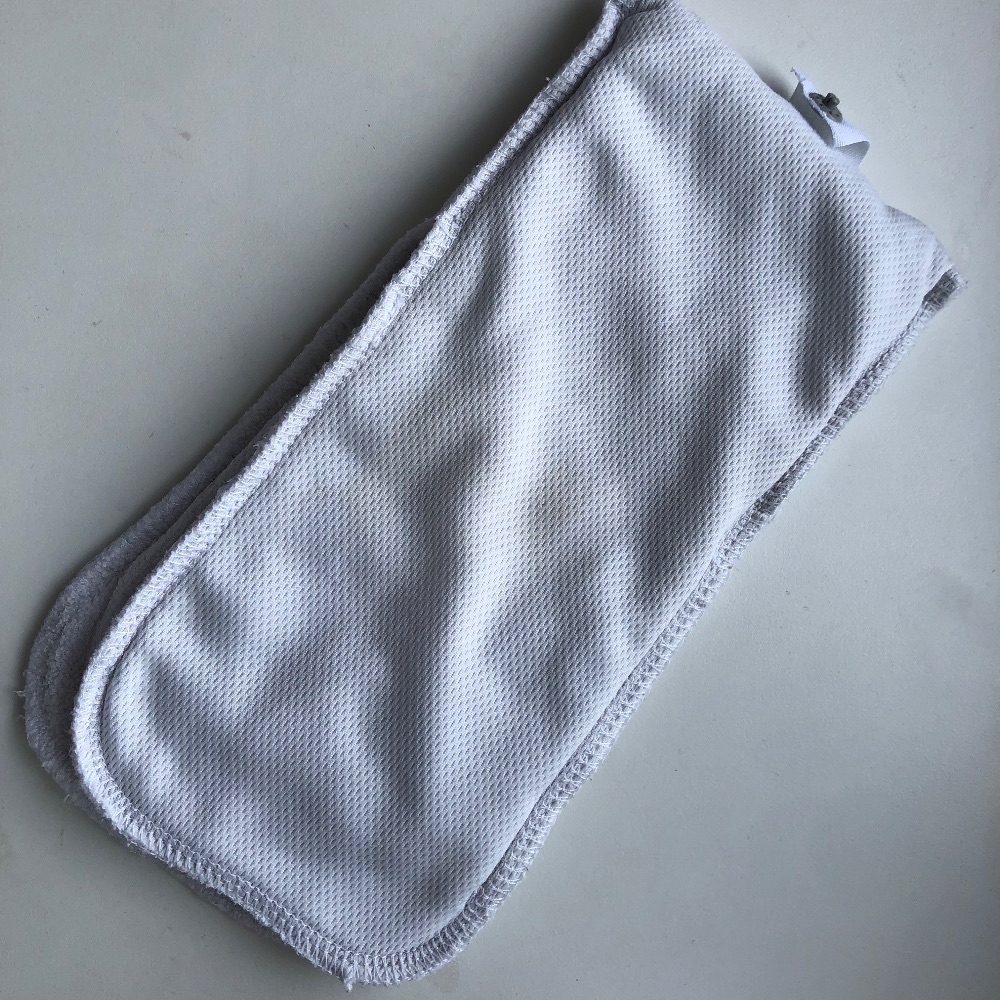 Newborn Stoffwindelpaket von Pop In, 4 Überhosen, 13 Einlagen